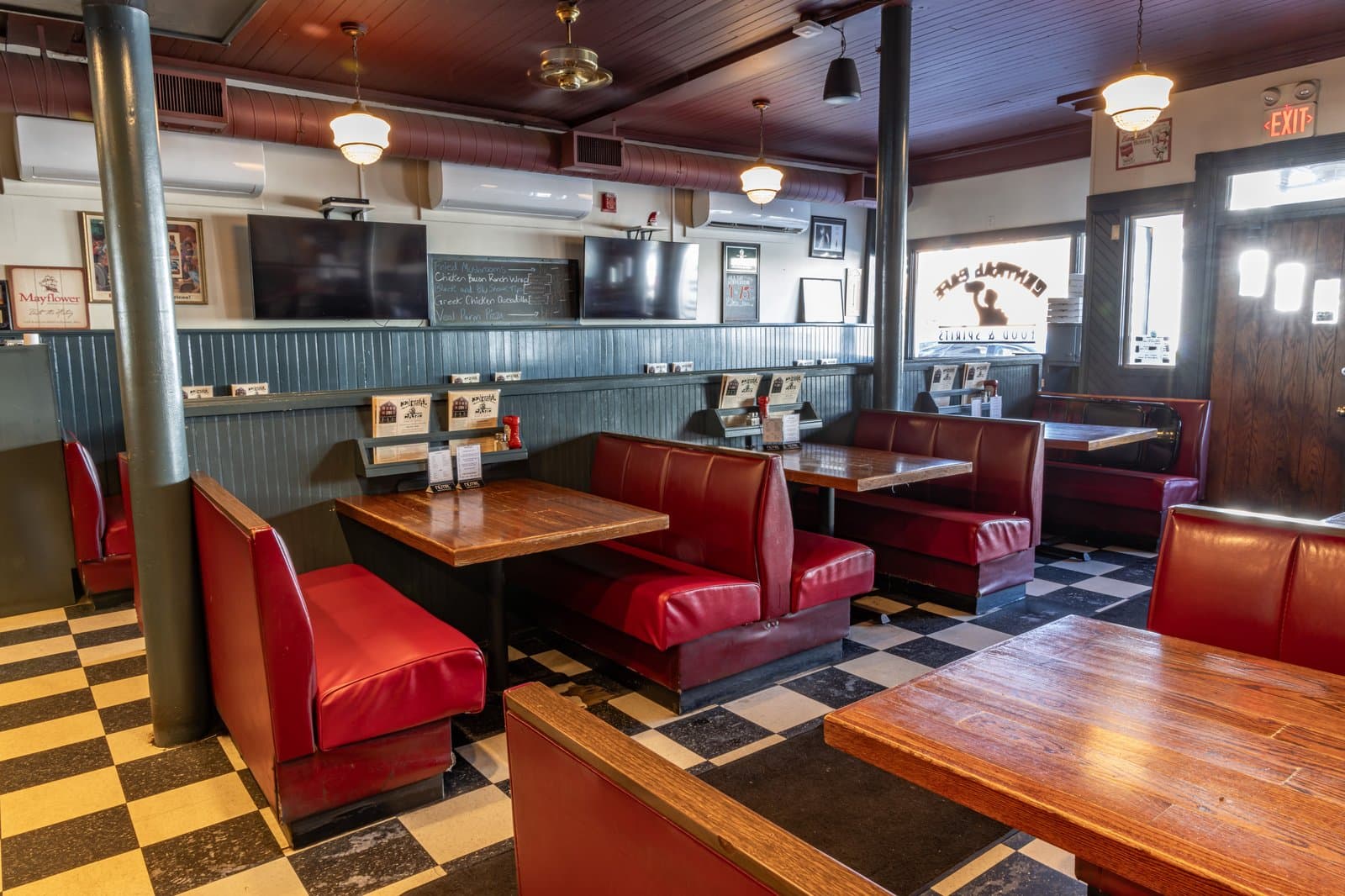Red booths and checkered floor in the Central Cafe dining room